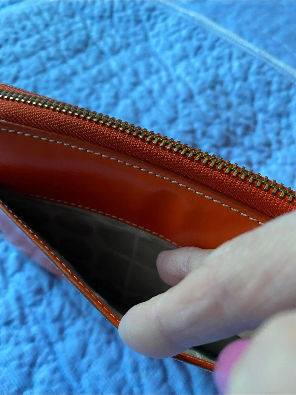 kate spade orange  Leather Zip Around Wallet with Gold Logo with pink inside